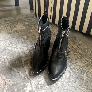 Steve Madden ankle booties with buckles, zippers and silver studs. Size 8M